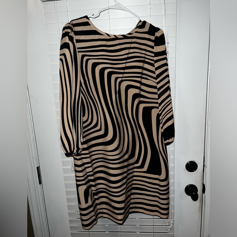 Tahari knee-length, long sleeve dress. Never worn.